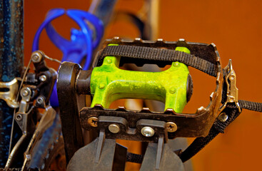 detail of mountain bike bicycle pedal used in sandy terrain