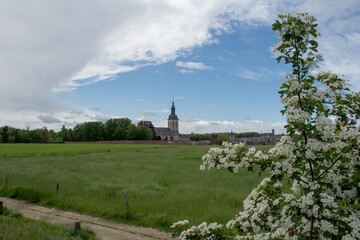 View  from across the fields on Norbertine abbey of Park in Leuven, Belgium 