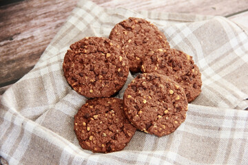dry sweet oatmeal cookies with chocolate pieces