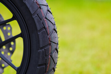 Close-up of motorcycle brakes and front wheel