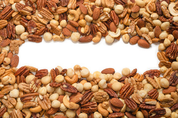 Mix of nuts isolated on white background. Top view.