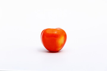 Fresh red tomato isolated on white background