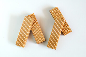 Wafers with chocolate on white background. food health.