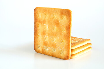 Sweet cracker cookies or biscuits on background, concept of food.