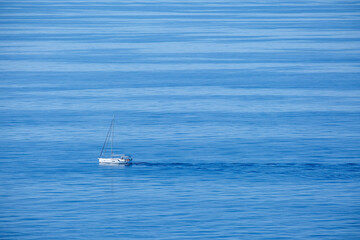 Obraz premium pleasure boat sailing through the bay of Palma, Mallorca, Balearic Islands, Spain