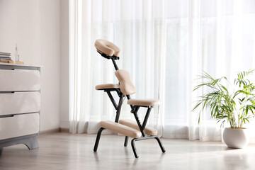 Modern massage chair in clinic. Medical equipment