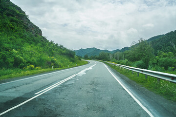 Vacation roadtrip landscape. Russian Altai mountains. Multa region. Holiday at home. Staycation concept. Long distanse road. Reduce carbon footprint. Sustainable lifestyle. Holiday trail. Local travel