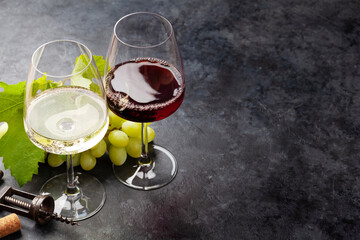 White and red wine glasses and white grape