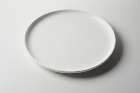 Catering concept with clean empty white circular plate