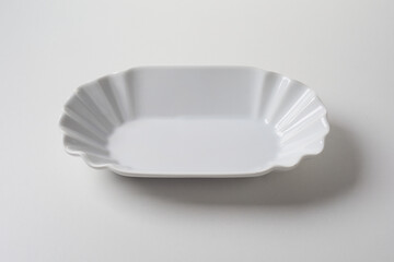 Elegant decorative clean empty fluted white porcelain dish