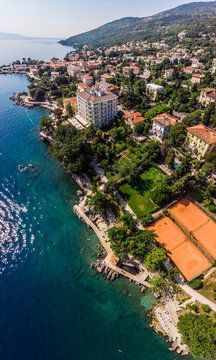 Beautiful panoramic view of Lovran village and its sea shore in Croatia. Top view photo taken on drone.