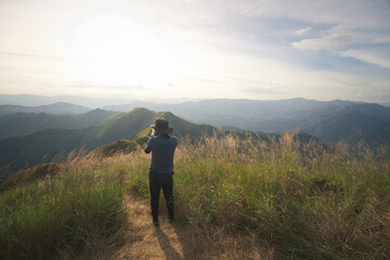 hiking group on mountain at Khao Chang Phuak, Thongphaphoom National Park, Kanchanaburi Province,...