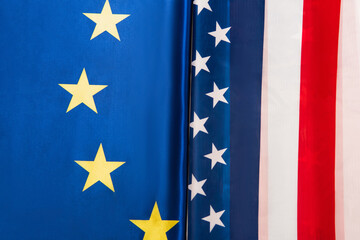 top view of blue european union and american flags on surface