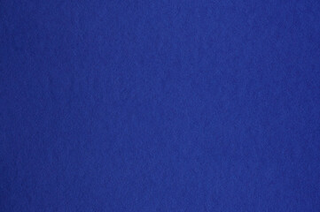 Closeup of seamless dark blue paper texture