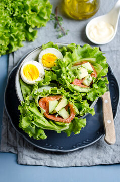 Burritos with lettuce, smoked salmon and cucumber