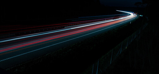 lights of moving cars at night. long exposure