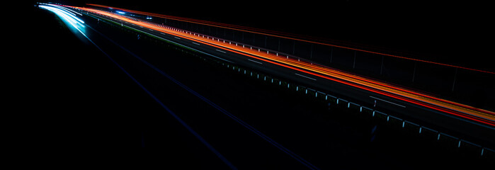 lights of moving cars at night. long exposure