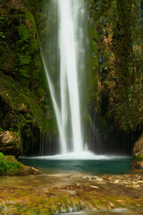 Fototapeta na wymiar waterfall in the forest. Vadu Crisului waterfall, Bihor, Romania