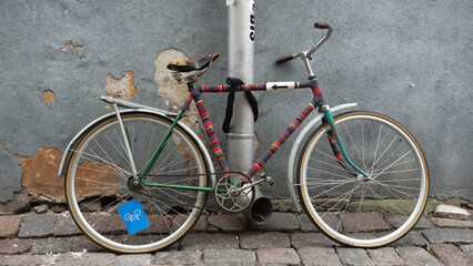 Fototapeta na wymiar old bicycle in the street, Tallinn, Estonia
