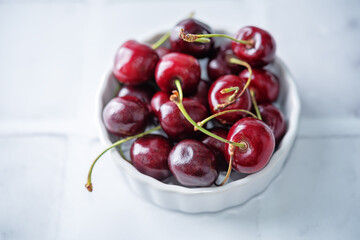 Raw fresh cherry on a white background