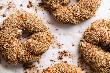 Simit Bread covered with sesame seeds on greaseproof paper