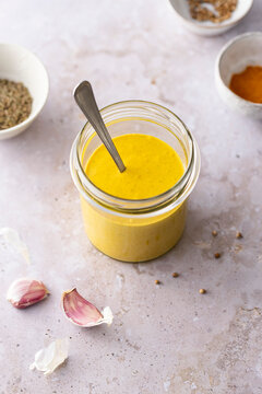 Golden turmeric tahini dressing preparation