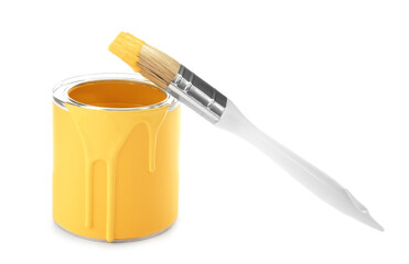 Can of yellow paint with brush on white background