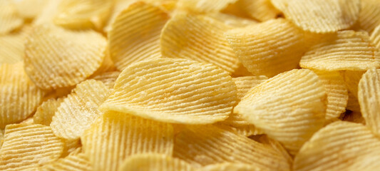 crispy golden potato chips snack texture background