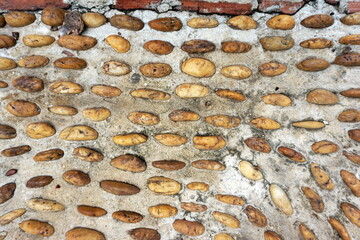 cracked cement covered with gray cement surface as background for design