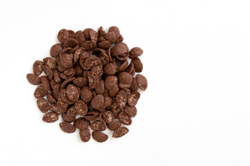 chocolate flakes isolated on white background, healthy breakfast concept