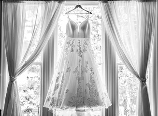 Wedding Dress Hanging on Window