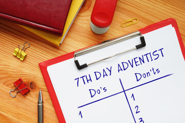 Business concept meaning 7TH DAY ADVENTIST Do's and Don'ts with phrase on the piece of paper.