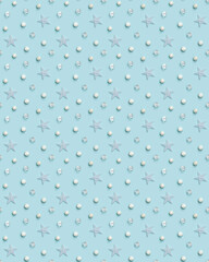 Christmas decorations white stars, glass ball, transparent beads, snowballs on blue color. New Year Xmas holiday