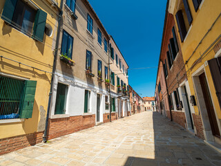 Venezia tight and old architecture Fassade shapes with blue sky background