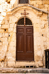 Fototapeta na wymiar church door and cross