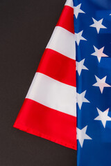 close up of red and blue flag of america isolated on black
