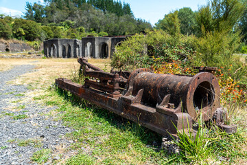 Old machines in deserted stamping battery in Karangahake, Coromandel peninsula in New Zealand