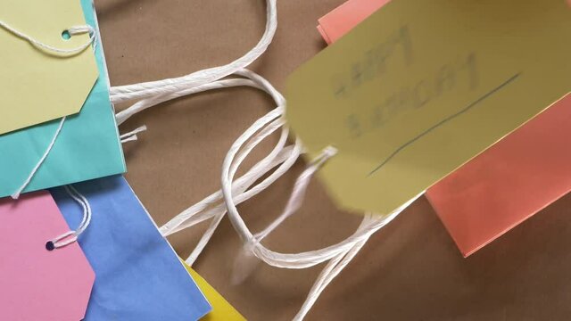 Arranging birthday gifts bags and labels 