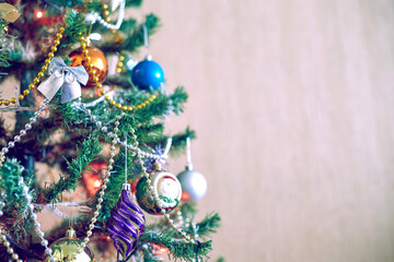 Christmas and New Year's toys on the Christmas tree. Selective focus.