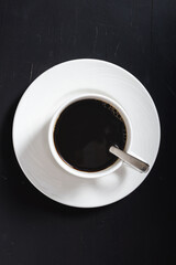 Coffee mug isolated on black background top view