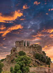 Fototapeta premium Medieval Castle With A Dramatic Sky, Located In Alburquerque, Extremadura, Spain.