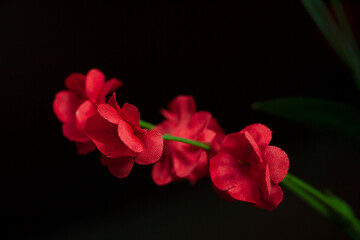 Red artificial flowers