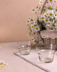 still life with flowers and cup of tea