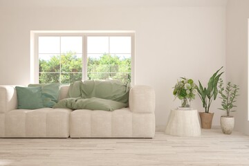 White living room with sofa and summer landscape in window. Scandinavian interior design. 3D illustration