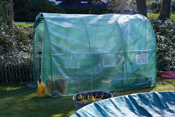 tent in the garden for growing own vegetables