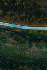 Top view aerial of road and mountain creek through Zlatibor landscape