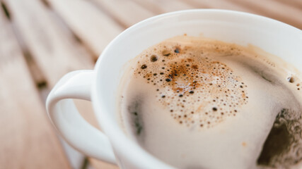 Close up of coffee cup on balcony table