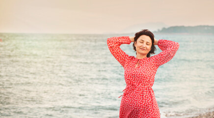 Happy woman with closed eyes enjoy outdoor life in summer, vacation, vacation, travel