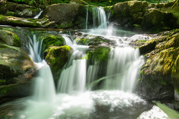 Long exposure of a waterfall on the Hoar Oak Water river at Watersmmeet in Exmoor National Park