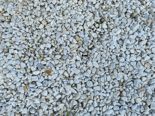 White texture from small sharp natural decorative stones. The background